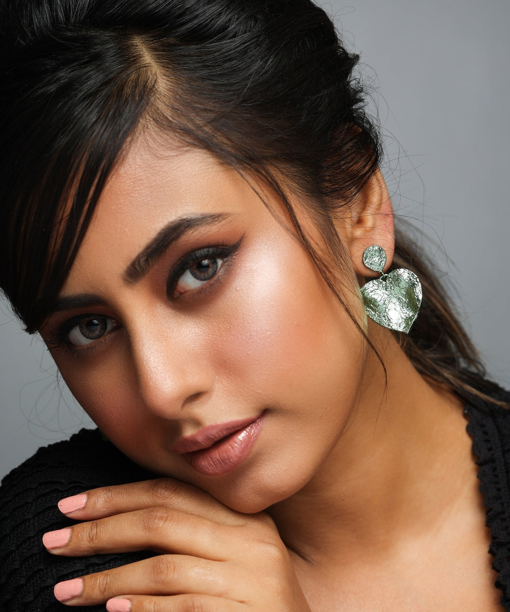 Seema Sajdeh seen wearing MNSH Mini Crushed Heart Green Earrings