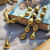 Bold Gold Shoulder Dusters